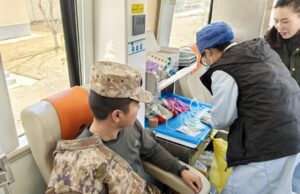 Ciidan katirsan Militariga Shiinaha oo dhiig u shubay Dadkii ku dhaawacmay Dhul gariirka ku dhuftay Dalkaas